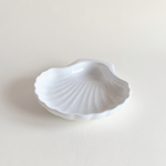 White Italian porcelain shell-form oven dish on a neutral surface