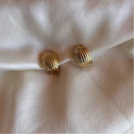 Small golden oval clip earrings, elegant vintage design