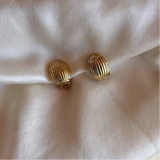 Small golden oval clip earrings, elegant vintage design