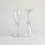 Italian champagne tulip flutes — close-up of rounded base showing distinctive curved foot, approx. 75g per glass