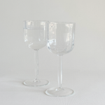 Italian ribbed white wine glasses — set of 2, front view showing ribbed bowl and hexagonal geometric stem, 2000s Italian production