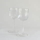 Italian ribbed white wine glasses — set of 2, front view showing ribbed bowl and hexagonal geometric stem, 2000s Italian production