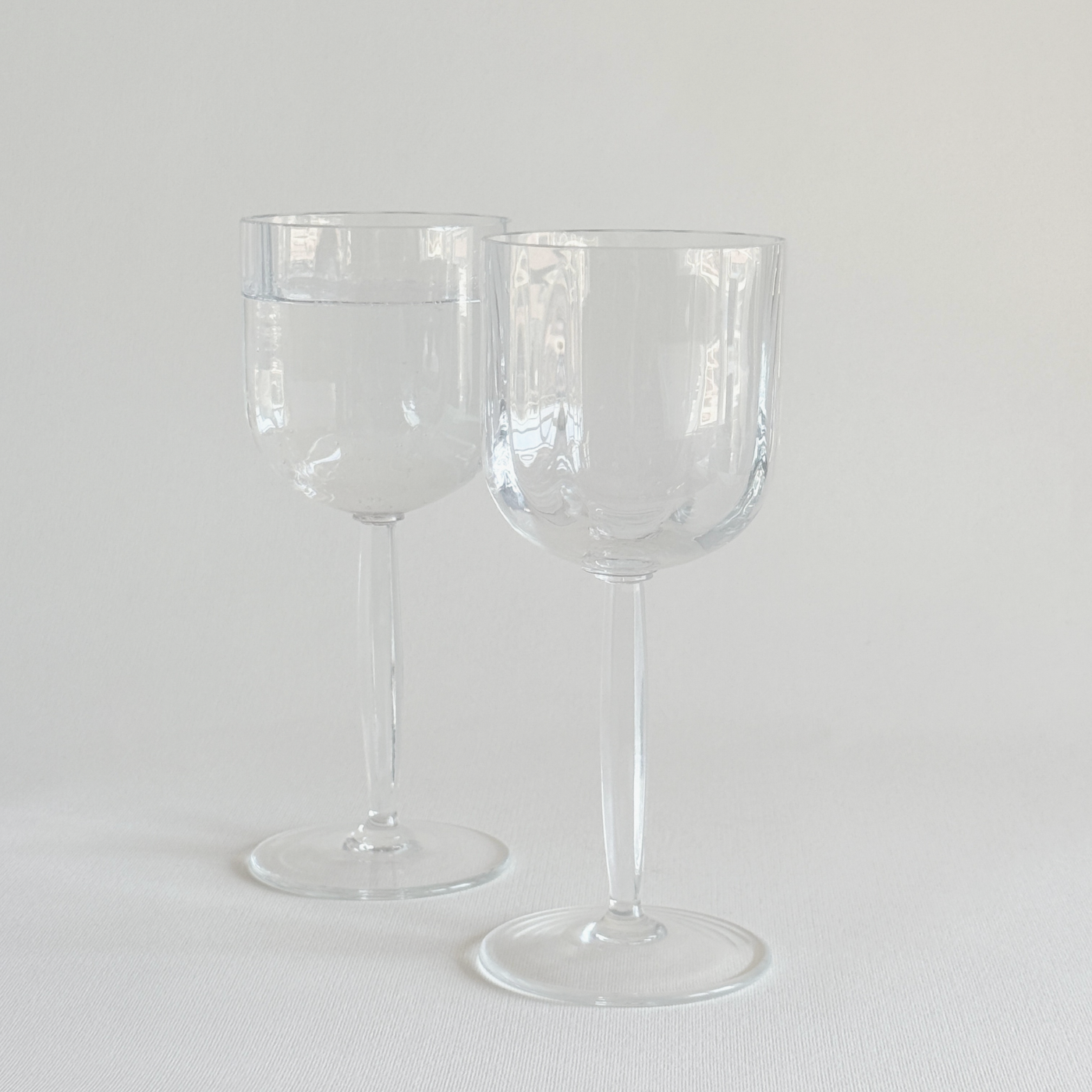 Italian ribbed white wine glasses — set of 2, front view showing ribbed bowl and hexagonal geometric stem, 2000s Italian production